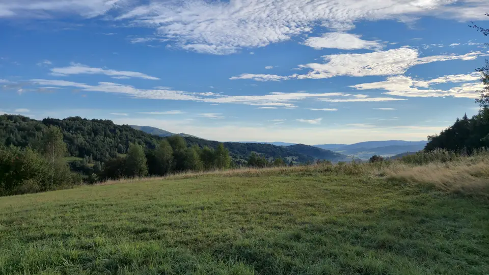 Cloud-Strewn Meadow Over the Hills