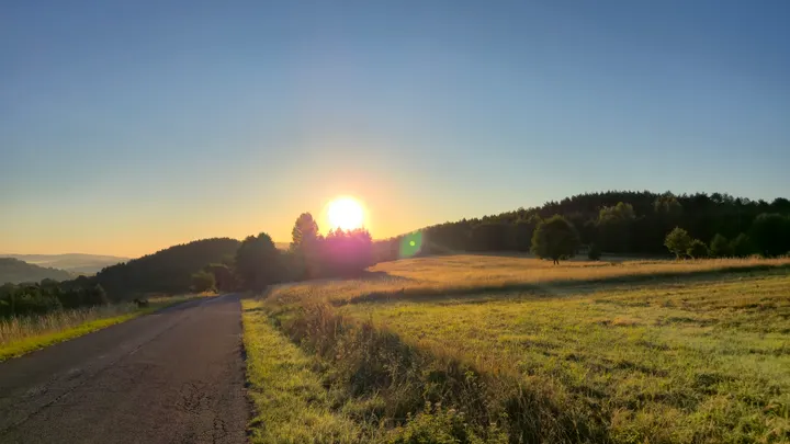Sunrise Over the Meadow Road