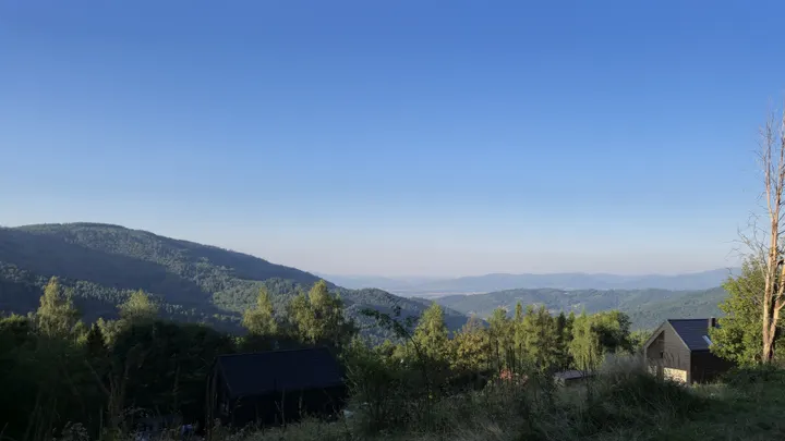 Dark Cabins Over the Ridges